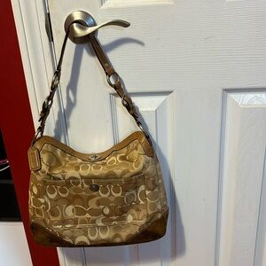 Tan and brown Coach purse